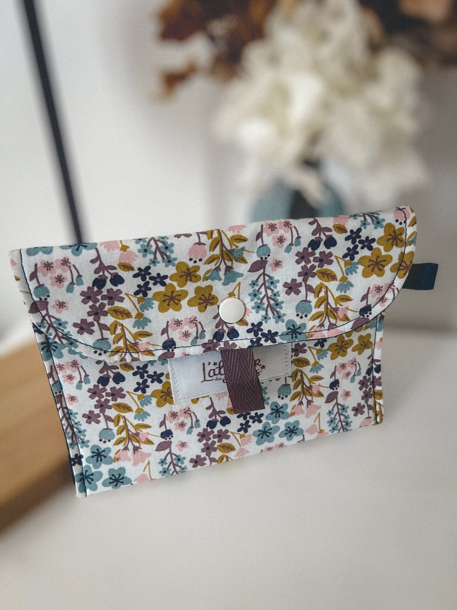 Pochette à maquillage fleurie bleu et jaune