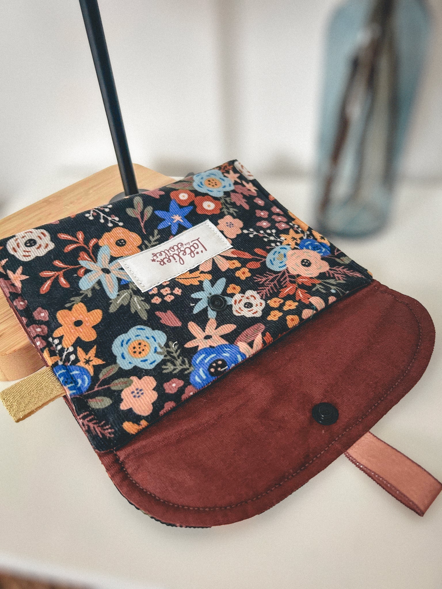 Pochette à maquillage motif automnal fleuri