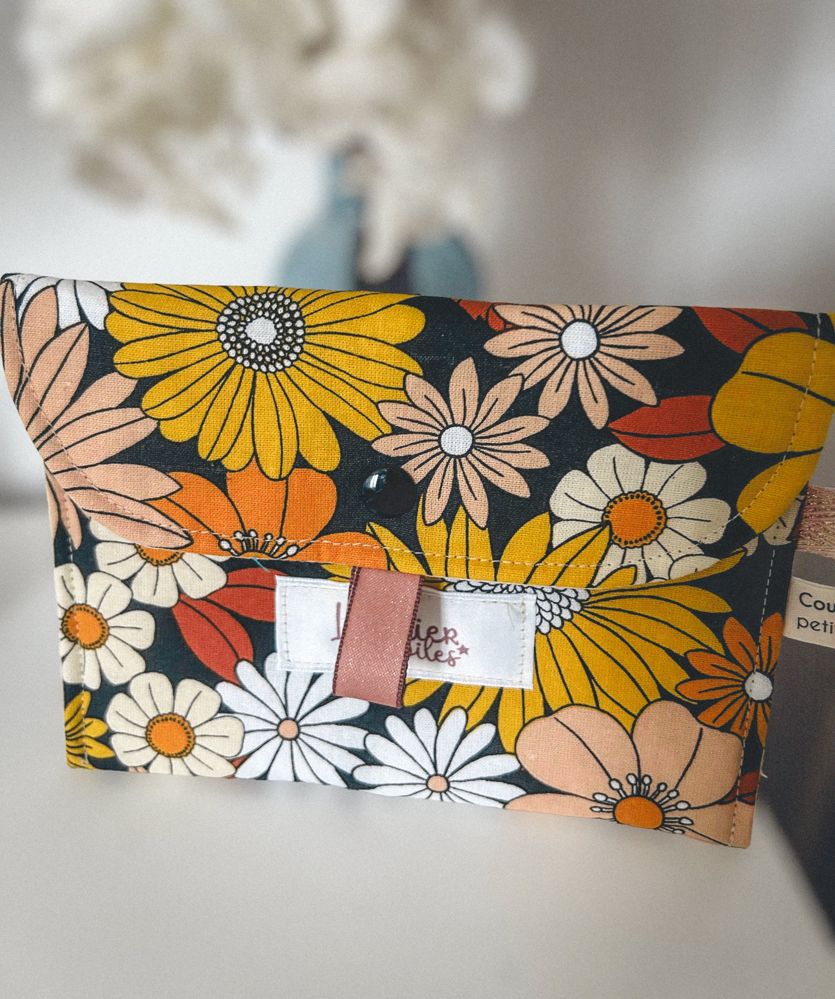 Pochette à maquillage motif printanier