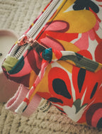 Trousse zippée en tissu – Motif floral d’été