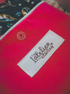 Pochette à liseuse – Fleurie bleu & rose fuchsia